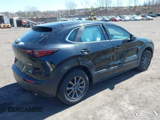 2021 Mazda CX-30 S with VIN 3MVDMBAL3MM214735, listed as a IAAI auction lot 42000096 with 46,794 mi miles and . Bid and sale history available at DreamBid. Image 4.