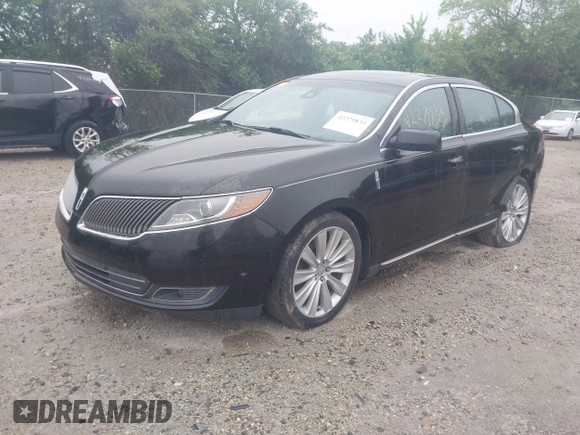 2013 Lincoln MKS EcoBoost with VIN 1LNHL9FT4DG607785, listed as a IAAI auction lot 42279833 with 126,548 mi miles and . Bid and sale history available at DreamBid. Image 2.