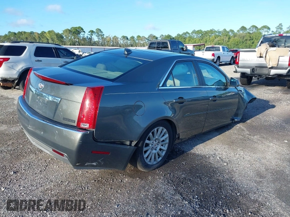 2011 Cadillac CTS Luxury with VIN 1G6DE5EY5B0154563, listed as a IAAI auction lot 36806985 with 92,635 mi miles and . Bid and sale history available at DreamBid. Image 4.