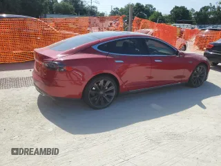 2014 Tesla Model S 60 z VIN 5YJSA1H19EFP27946, wystawiony jako Copart lot #61284625 z przebiegiem 109 147 mil mil oraz Szkoda całkowita • Salvage title. Historia ofert i sprzedaży dostępna na DreamBid. Obrazek 3.