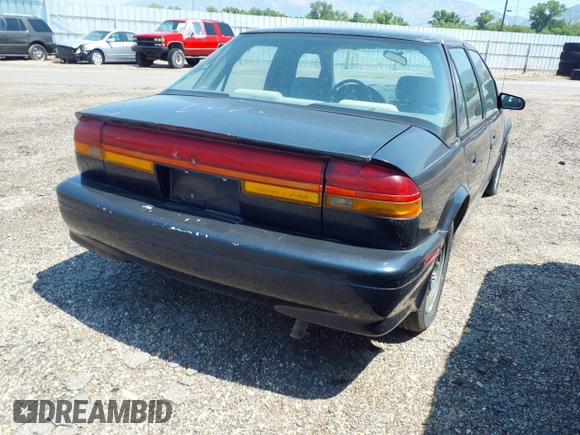 1994 Saturn SL z VIN 1G8ZJ557XRZ269410, wystawiony jako IAAI lot #31653894 z przebiegiem 132 202 mil mil oraz . Historia ofert i sprzedaży dostępna na DreamBid. Obrazek 4.