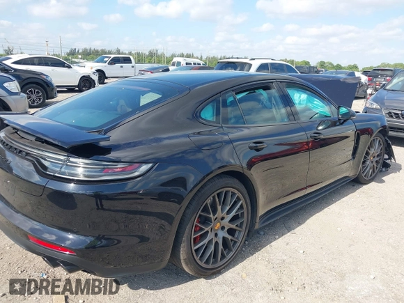 2021 Porsche Panamera GTS with VIN WP0AG2A74ML147997, listed as a IAAI auction lot 42103486 with 10,517 mi miles and . Bid and sale history available at DreamBid. Image 4.