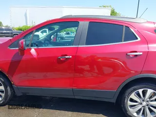 2020 Buick Encore Preferred with VIN KL4CJASB2LB063490, listed as a IAAI auction lot 42037574 with 57,350 mi miles. Bid and sale history available at carsss.com. Image 14.