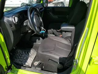 2013 Jeep Wrangler Unlimited Sport z VIN 1C4BJWDG2DL558484, wystawiony jako Copart lot #55832725 z przebiegiem 211 683 mil mil oraz Szkoda całkowita • Salvage title. Historia ofert i sprzedaży dostępna na DreamBid. Obrazek 7.