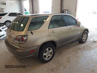 2003 Lexus RX 300 with VIN JTJHF10U030308975, listed as a IAAI auction lot 42632621 with 302,780 mi miles and . Bid and sale history available at DreamBid. Image 4.