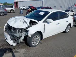 2015 Nissan Sentra SV z VIN 3N1AB7AP8FY323250, wystawiony jako IAAI lot #42217284 z przebiegiem 66 951 mil mil oraz . Historia ofert i sprzedaży dostępna na DreamBid. Obrazek 2.