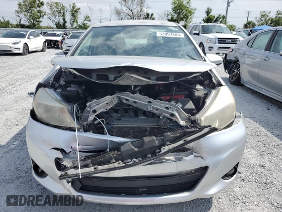 2012 Toyota Yaris L with VIN JTDJTUD39CD508388, listed as a Copart auction lot 53897885 with 118,256 mi miles and Salvage Title. Bid and sale history available at carsss.com. Image 5.