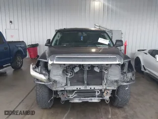 2014 Toyota Tundra 2WD Truck SR with VIN 5TFRY5F15EX166929, listed as a IAAI auction lot 41458810 with 142,152 mi miles. Bid and sale history available at carsss.com. Image 12.