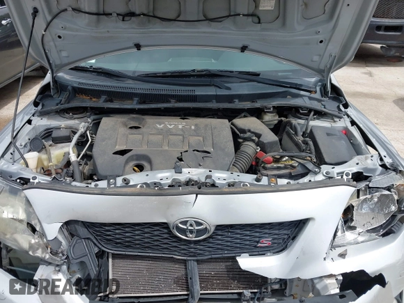 2010 Toyota Corolla with VIN 2T1BU4EE1AC480579, listed as a IAAI auction lot 42210623 with 123,795 mi miles. Bid and sale history available at carsss.com. Image 10.