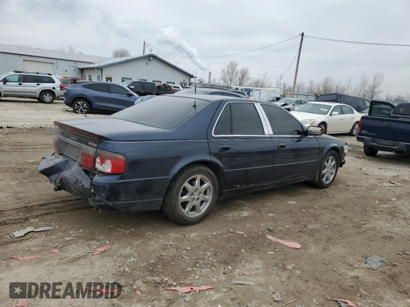 2002 Cadillac Seville Touring STS z VIN 1G6KY54932U174599, wystawiony jako Copart lot #44996845 z przebiegiem 168 819 mil mil oraz Szkoda całkowita • Salvage title. Historia ofert i sprzedaży dostępna na DreamBid. Obrazek 3.