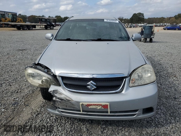 2006 Suzuki Forenza z VIN KL5JD56Z96K362651, wystawiony jako Copart lot #78306894 z przebiegiem 167 916 mil mil oraz Tytuł czysty. Historia ofert i sprzedaży dostępna na DreamBid. Obrazek 5.