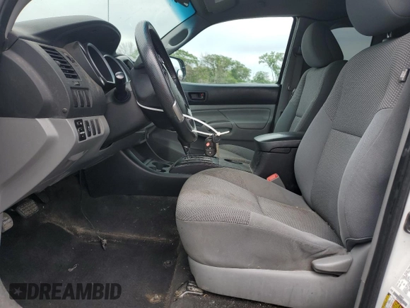 2014 Toyota Tacoma PreRunner with VIN 5TFTX4GN5EX034712, listed as a Copart auction lot 62173035 with 139,379 mi miles and Salvage title. Bid and sale history available at DreamBid. Image 7.