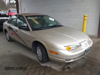 2002 Saturn SL z VIN 1G8ZH52852Z155698, wystawiony jako IAAI lot #41712058 z przebiegiem 90 150 mil mil oraz . Historia ofert i sprzedaży dostępna na DreamBid. Obrazek 1.
