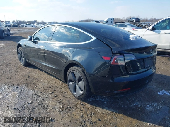 2020 Tesla Model 3 Standard Range Plus z VIN 5YJ3E1EA6LF662080, wystawiony jako IAAI lot #41410445 z przebiegiem Nie podano mil oraz . Historia ofert i sprzedaży dostępna na DreamBid. Obrazek 3.