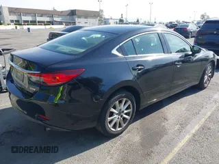 2016 Mazda 6 i Sport with VIN JM1GJ1U51G1445925, listed as a IAAI auction lot 41980386 with Not Provided miles and . Bid and sale history available at DreamBid. Image 4.
