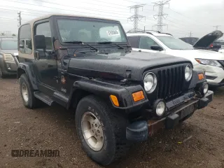 2000 Jeep Wrangler Sahara z VIN 1J4FA59S2YP714136, wystawiony jako Copart lot #57635845 z przebiegiem 178 075 mil mil oraz Czysty tytuł • Clean title. Historia ofert i sprzedaży dostępna na DreamBid. Obrazek 4.
