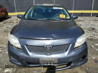 2009 Toyota Corolla with VIN 2T1BU40E69C140217, listed as a Copart auction lot 52199345 with 105,505 mi miles and Salvage Title. Bid and sale history available at carsss.com. Image 5.