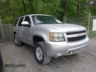 2014 Chevrolet Tahoe LT z VIN 1GNSCBE03ER185739, wystawiony jako IAAI lot #42122871 z przebiegiem 217 112 mil mil oraz . Historia ofert i sprzedaży dostępna na DreamBid. Obrazek 1.
