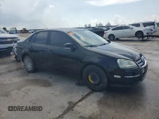 2010 Volkswagen Jetta S with VIN 3VWJZ7AJ3AM029692, listed as a Copart auction lot 61743435 with Not provided miles and Salvage title. Bid and sale history available at DreamBid. Image 4.