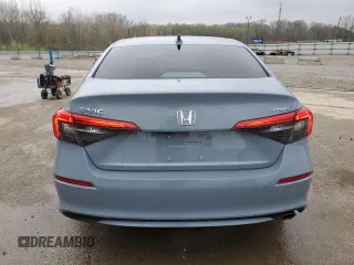 2023 Honda Civic Sedan Sport with VIN 2HGFE2F56PH557478, listed as a Copart auction lot 51128735 with 9,749 mi miles and Salvage Title. Bid and sale history available at carsss.com. Image 6.