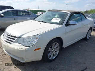 2010 Chrysler Sebring Touring with VIN 1C3BC5ED5AN105022, listed as a IAAI auction lot 42048657 with 188,920 mi miles and . Bid and sale history available at DreamBid. Image 2.
