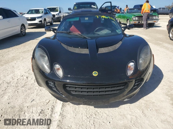 2006 Lotus Elise z VIN SCCPC11196HL30330, wystawiony jako Copart lot #77806924 z przebiegiem Nie podano mil oraz Szkody całkowita. Historia ofert i sprzedaży dostępna na DreamBid. Obrazek 5.