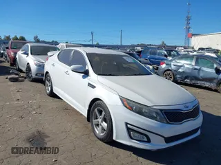 2015 Kia Optima LX with VIN 5XXGM4A72FG397031, listed as a IAAI auction lot 40628126 with 170,106 mi miles. Bid and sale history available at carsss.com. Image 1.