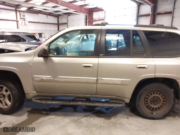 2003 GMC Envoy SLT with VIN 1GKDS13S932299354, listed as a IAAI auction lot 41238557 with 251,535 mi miles. Bid and sale history available at carsss.com. Image 15.