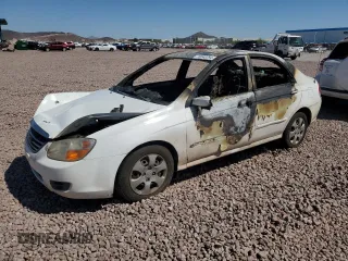 2008 Kia Spectra EX with VIN KNAFE122485556713, listed as a Copart auction lot 70048794 with 0 mi miles and Non Repairable. Bid and sale history available at carsss.com. Image 1.