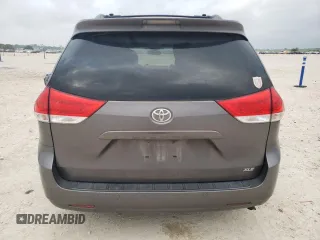 2014 Toyota Sienna XLE with VIN 5TDYK3DC2ES510647, listed as a Copart auction lot 54488845 with 216,091 mi miles and Salvage Title. Bid and sale history available at DreamBid. Image 6.