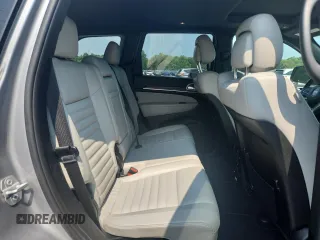 2018 Jeep Grand Cherokee Limited z VIN 1C4RJEBG4JC281330, wystawiony jako Copart lot #57954545 z przebiegiem 63 035 mil mil oraz Szkoda całkowita • Salvage title. Historia ofert i sprzedaży dostępna na DreamBid. Obrazek 11.