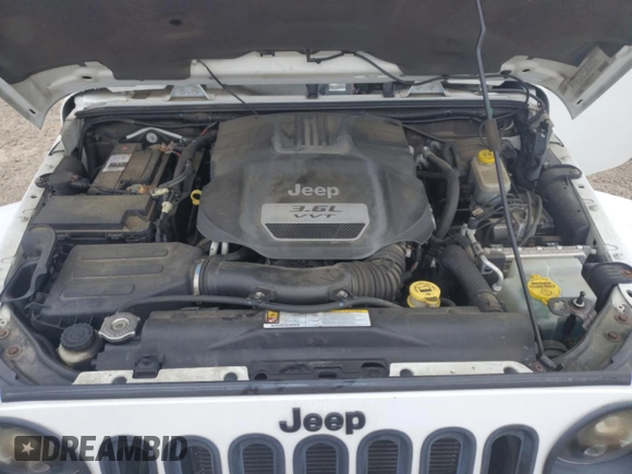 2012 Jeep Wrangler Unlimited Sahara with VIN 1C4HJWEG8CL126053, listed as a Copart auction lot 54363285 with 88,014 mi miles and Salvage title. Bid and sale history available at DreamBid. Image 11.