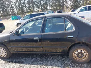 1996 Nissan Altima XE with VIN 1N4BU31D1TC119359, listed as a IAAI auction lot 41664170 with 140,672 mi miles and . Bid and sale history available at DreamBid. Image 15.
