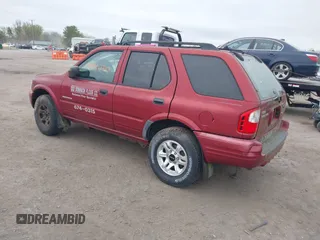 2004 Isuzu Rodeo S z VIN 4S2CK58W644317345, wystawiony jako IAAI lot #41940961 z przebiegiem Nie podano mil oraz . Historia ofert i sprzedaży dostępna na DreamBid. Obrazek 3.