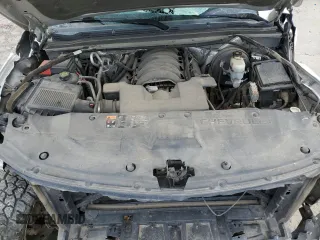 2016 Chevrolet Suburban LT z VIN 1GNSKHKC4GR285212, wystawiony jako Copart lot #58021115 z przebiegiem Nie podano mil oraz Szkoda całkowita • Salvage title. Historia ofert i sprzedaży dostępna na DreamBid. Obrazek 12.