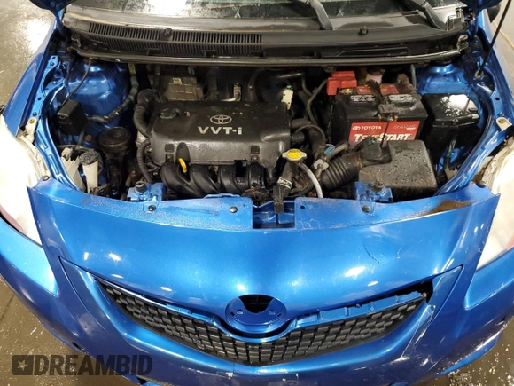 2009 Toyota Yaris with VIN JTDBT903991315725, listed as a Copart auction lot 52566735 with 177,044 mi miles and Salvage Title. Bid and sale history available at DreamBid. Image 11.