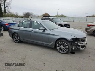 2019 BMW 5 Series 530e xDrive with VIN WBAJB1C56KB375312, listed as a Copart auction lot 52709125 with 63,422 mi miles and Salvage title. Bid and sale history available at DreamBid. Image 4.