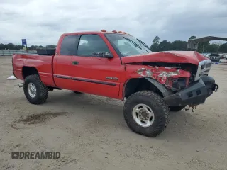 2000 Dodge Ram 2500 with VIN 1B7KF236XYJ100955, listed as a Copart auction lot 70304884 with 250,592 mi miles and Salvage Title. Bid and sale history available at carsss.com. Image 4.
