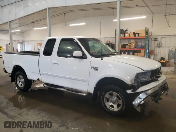 1999 Ford F-150 XL with VIN 2FTRX18L1XCA22096, listed as a Copart auction lot 52402885 with 120,254 mi miles and Salvage Title. Bid and sale history available at carsss.com. Image 4.