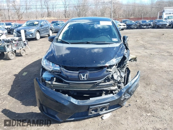 2015 Honda Fit LX z VIN 3HGGK5H51FM775176, wystawiony jako IAAI lot #41690648 z przebiegiem 49 979 mil mil oraz . Historia ofert i sprzedaży dostępna na DreamBid. Obrazek 12.