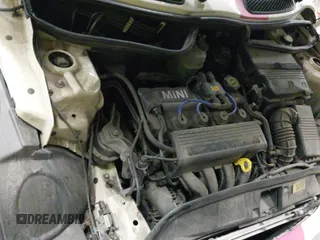 2006 MINI Hardtop with VIN WMWRC33506TK15034, listed as a IAAI auction lot 42349957 with 153,596 mi miles and . Bid and sale history available at DreamBid. Image 19.
