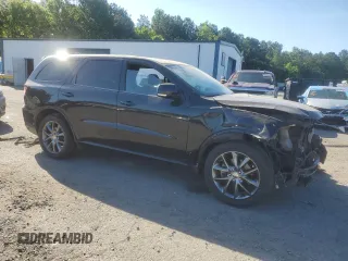 2014 Dodge Durango R/T with VIN 1C4SDJCT9EC596160, listed as a Copart auction lot 58034505 with 140,674 mi miles and Salvage title. Bid and sale history available at DreamBid. Image 4.
