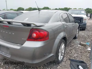2013 Dodge Avenger SXT with VIN 1C3CDZCB1DN576762, listed as a IAAI auction lot 41938493 with 168,149 mi miles and . Bid and sale history available at carsss.com. Image 4.