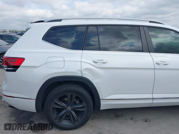2022 Volkswagen Atlas SEL R-Line z VIN 1V2AR2CA7NC550648, wystawiony jako IAAI lot #41974370 z przebiegiem 48 378 mil mil oraz . Historia ofert i sprzedaży dostępna na DreamBid. Obrazek 6.