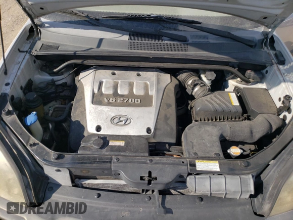 2005 Hyundai Tucson GLS with VIN KM8JN12DX5U212587, listed as a Copart auction lot 72044114 with 128,993 mi miles and Salvage Title. Bid and sale history available at carsss.com. Image 12.