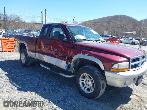2003 Dodge Dakota SLT with VIN 1D7HG42N33S369870, listed as a IAAI auction lot 41826771 with 214,840 mi miles. Bid and sale history available at carsss.com. Image 1.