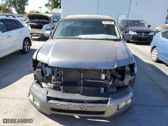 2011 Honda Ridgeline RTL with VIN 5FPYK1F58BB452957, listed as a Copart auction lot 63214204 with 223,311 mi miles and Salvage Title. Bid and sale history available at carsss.com. Image 5.