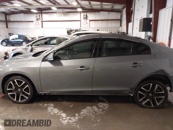 2017 Volvo S60 Dynamic with VIN YV140MTL0H2437537, listed as a IAAI auction lot 40801631 with 55,153 mi miles. Bid and sale history available at carsss.com. Image 15.