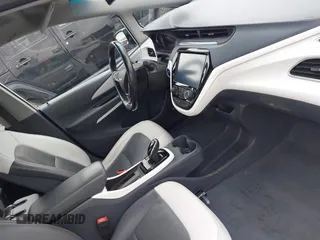 2018 Chevrolet Bolt EV Premier with VIN 1G1FX6S02J4133190, listed as a IAAI auction lot 41363945 with 57,228 mi miles. Bid and sale history available at carsss.com. Image 5.