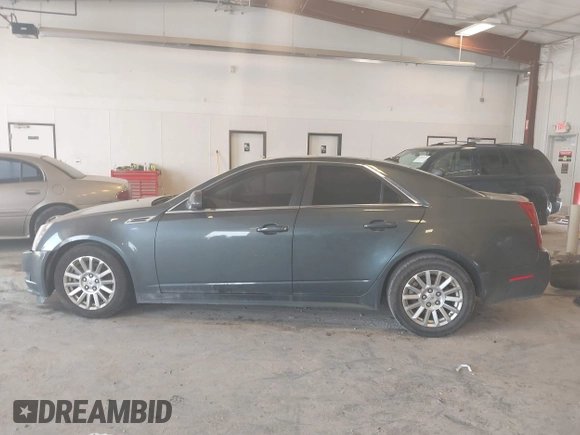 2010 Cadillac CTS Luxury with VIN 1G6DG5EG3A0146283, listed as a IAAI auction lot 42590369 with 219,961 mi miles and . Bid and sale history available at DreamBid. Image 14.